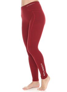 Women's EXTREME WOOL monochromatic red leggings. With the BRUBECK logo on the left hip, and left calf