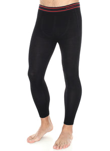 Men's ACTIVE WOOL full-length fitted pants. Pictured in the colour black with red trim around the waist