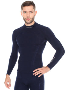 Men's EXTREME WOOL deep navy blue long-sleeve shirt. The fitted base layer features a white BRUBECK logo on the collar, and on the left forearm
