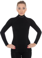 Solid Black women's EXTREME WOOL high-neck long-sleeve. Pictured from the front with matching EXTREME WOOL leggings