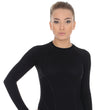 Load image into Gallery viewer, Women&#39;s sleek black fitted ACTIVE WOOL longsleeve crewneck. Custom designed for women&#39;s bodies to reach new levels of athletic performance in extreme temperatures