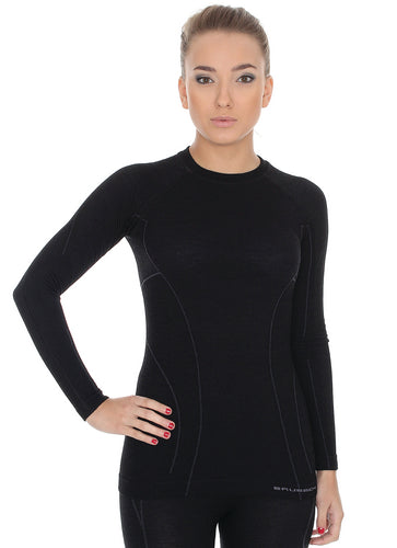 Women's sleek black fitted ACTIVE WOOL longsleeve crewneck. Custom designed for women's bodies to reach new levels of athletic performance in extreme temperatures