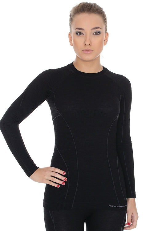 Women's sleek black fitted ACTIVE WOOL longsleeve crewneck. Custom designed for women's bodies to reach new levels of athletic performance in extreme temperatures