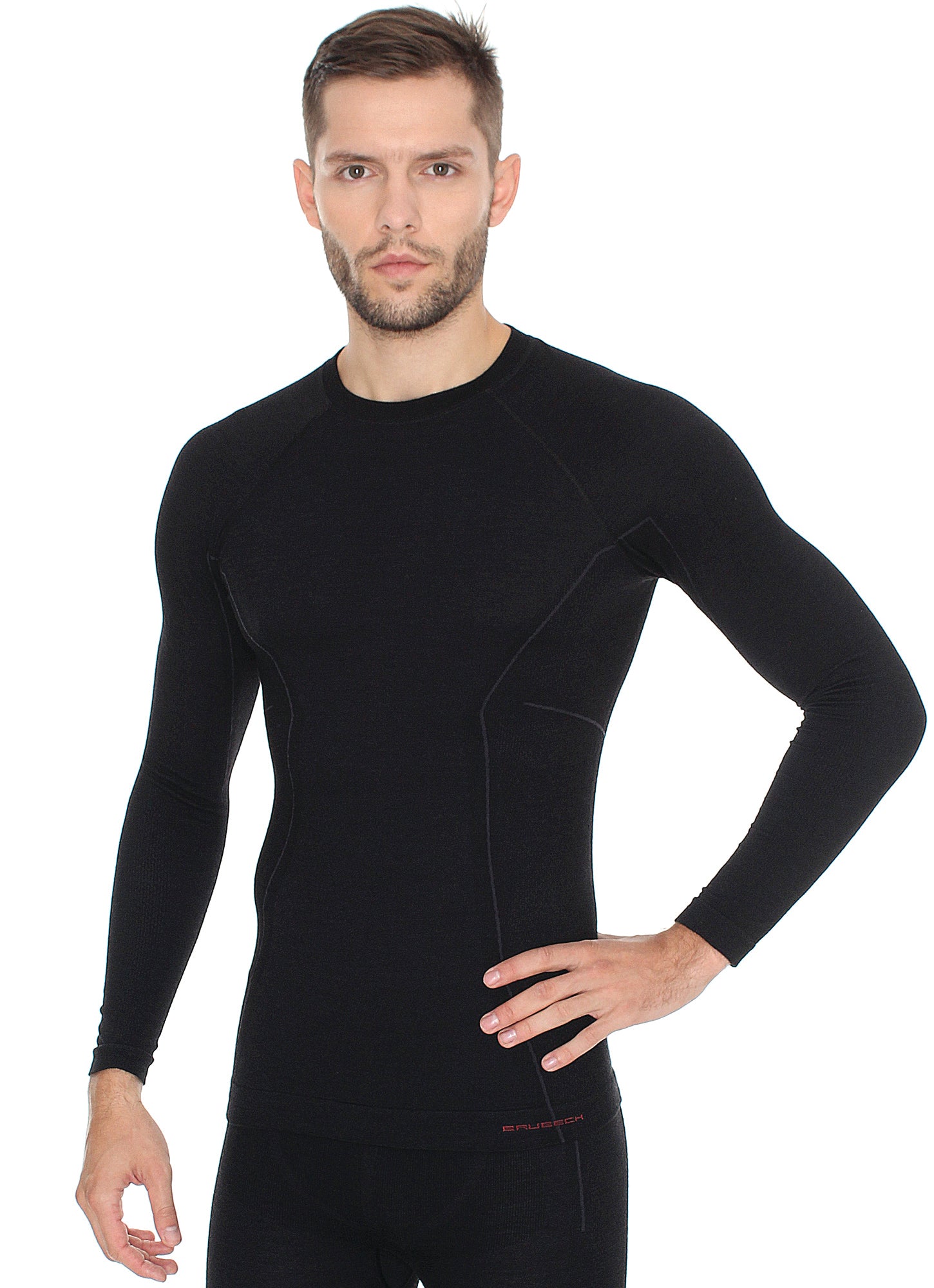 Men's sleek black ACTIVE WOOL long sleeve crewneck base layer. Pictured with matching ACTIVE WOOL workout leggings