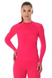 Women's THERMO warming long sleeve mock neck top. Pictured from the front in the colour raspberry, a bold pink with the BRUBECK logo under the collar. 