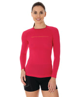 Woman modeling 3D run pro raspberry coloured long sleeve performance wear. 