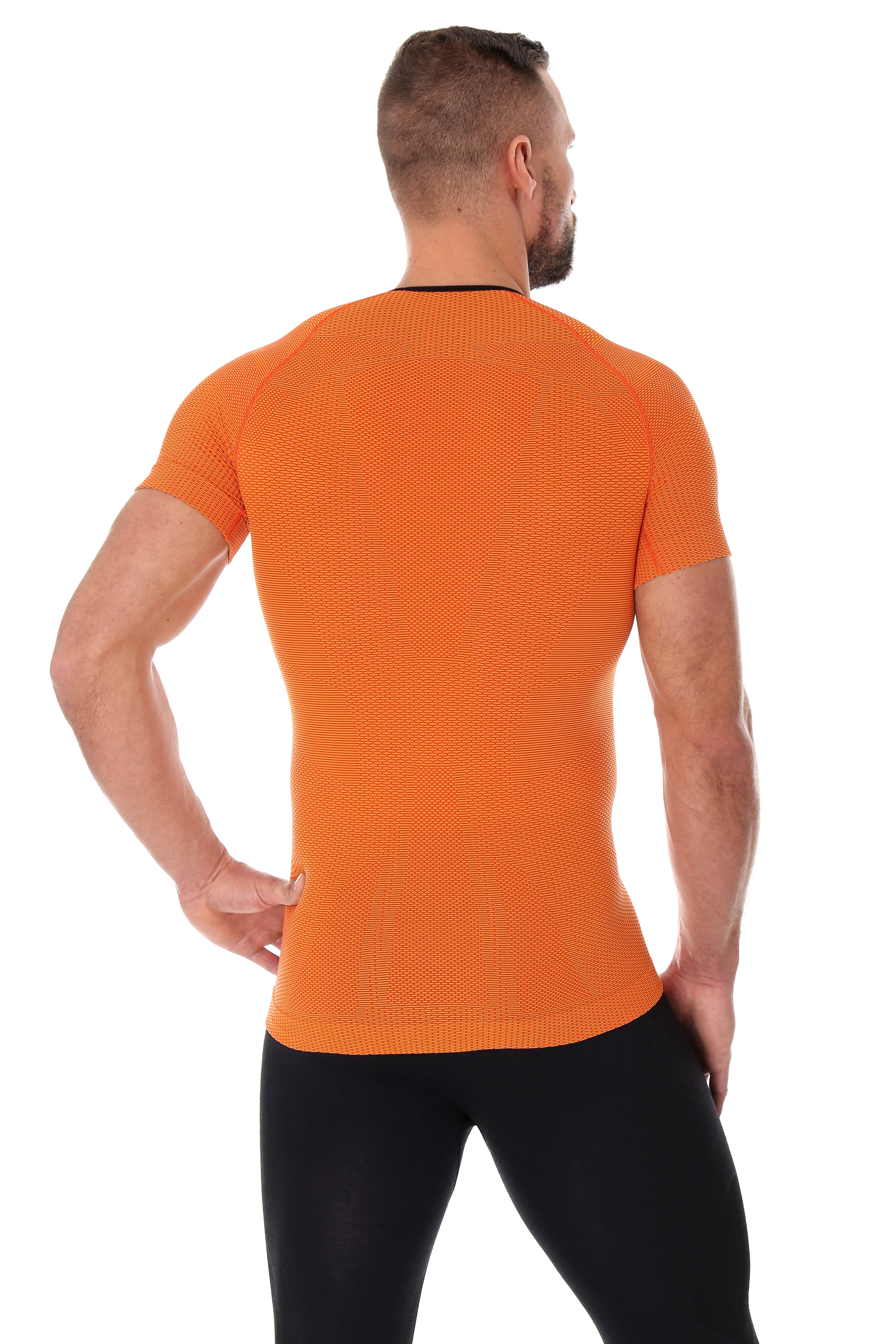 Men's orange 3D RUN PRO short-sleeved t-shirt. The fitted base layer features the logo centred on the chest, and black trim around the neck